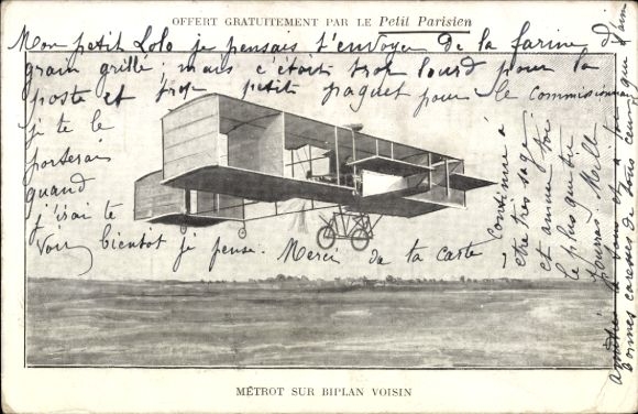 CPA Petit Parisien, Metrot sur Biplan Voisin