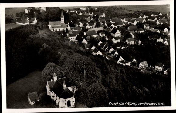 Postcard Erolzheim in Upper Swabia Württemberg, aerial view of Erolzheim, view of houses, forest in the foreground