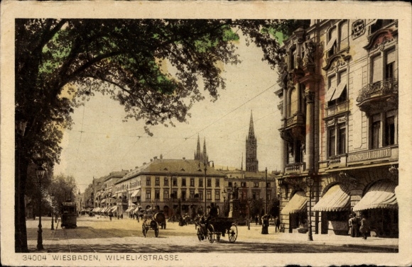 Postcard Wiesbaden in Hesse, street with buildings, trees, wagons, two church towers