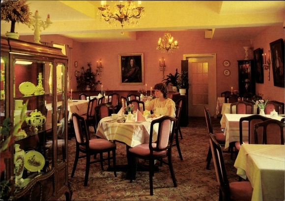 Postcard Büdingen in Hesse, café in the castle, guest sitting at the table