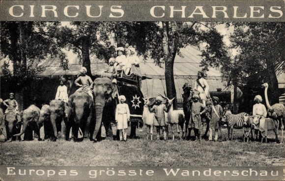 Postcard Circus Charles, Indian caravan with exotic animals, elephants, llamas, camels, zebras, ostriches