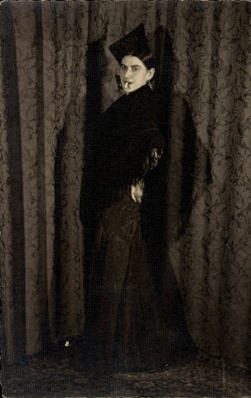 Photo Postcard standing portrait of a woman, black lace dress, cigarette
