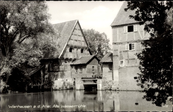 Ak Wienhausen in der Lüneburger Heide, Wassermühle, Wasser, Bäume, Gebäude, Schwarz-Weiß-Foto