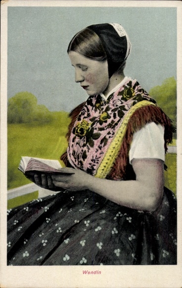 Postcard Wendin in traditional costume, book