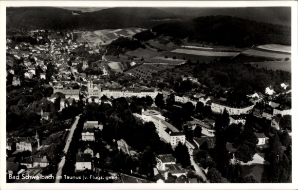 Postcard Bad Schwalbach im Taunus, aerial view of Bad Schwalbach, green hilly landscape, city view