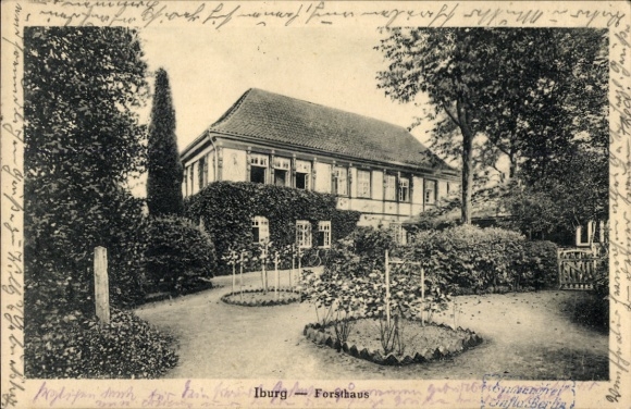Ak Bad Iburg am Teutoburger Wald, Vorderansicht des Forsthauses in  Gartenanlage, Bäume