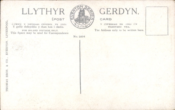Postcard Theres no place like Dear Old Wales, woman in costume