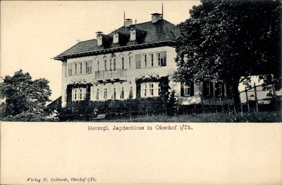Postcard Oberhof in the Thuringian Forest, ducal hunting lodge, building with windows, trees in the foreground