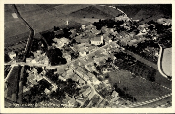 Ak Westerode Duderstadt im Eichsfeld, Luftaufnahme von  Kirche, Wohnhäuser, Felder