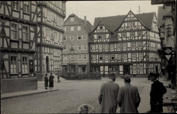 Photo Postcard Melsungen in Hesse, town hall, street section, half-timbered houses