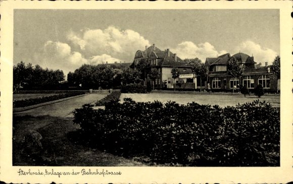 Ak Sterkrade Oberhausen am Rhein, Anlage an der Bahnhofstrasse, Bäume, Gebäude
