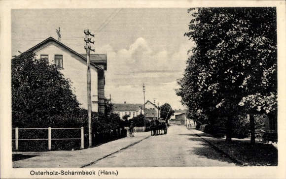 Ansichtkaart Osterholz Scharmbeck in Nedersaksen, straatbeeld met paardenkar