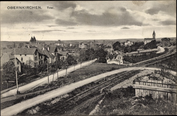 Postcard Obernkirchen in the Schaumburg district, view of the city with the railway line