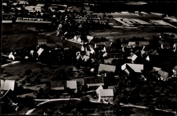 Postcard Martinsmoos Neubulach in the Black Forest, aerial view of a village, many roofs, rural surroundings