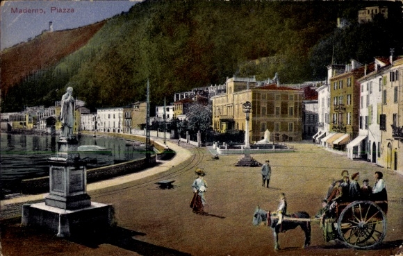 Ak Maderno Lombardia Italien, Stadtplatz, Statue, Fluss, Gebäude, Pferdewagen, Menschen