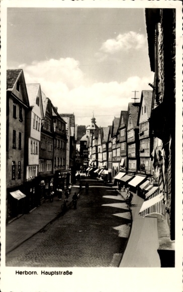 Postcard Herborn in Hesse, main street, building, street view, nice weather