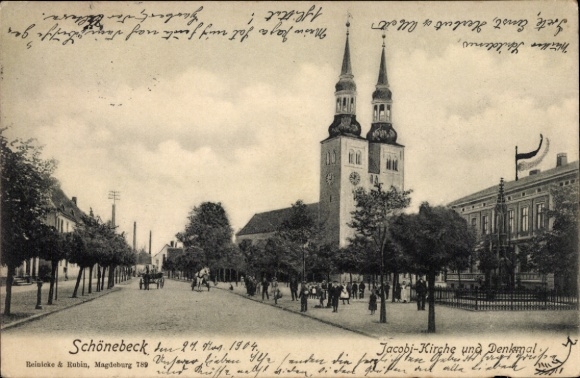 Postcard Schönebeck on the Elbe, city view with Jacobi Church, monument, trees, pedestrians