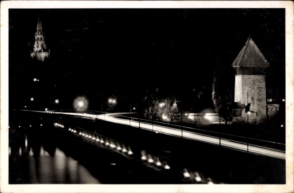 Ak Konstanz am Bodensee, Nachtaufnahme, Rheinforturm, Münster, Rheinbrücke, Bodensee