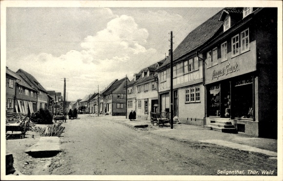 Postcard Bad Liebenstein in the Thuringian Forest, street with houses, trees, clouds, well-kept surroundings