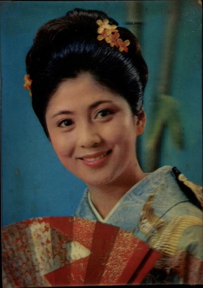 3D Postcard winking Asian woman, fan