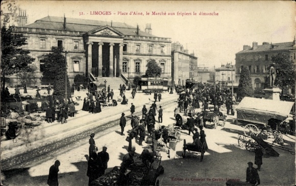 KP Limoges Haute Vienne, rynek z ludźmi, wózkami, drzewami i budynkami w tle