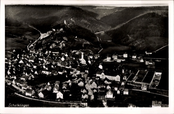 Postcard Schelklingen Swabian Alb, aerial view of many houses, green hills