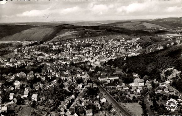 Postcard Betzdorf on the Sieg, aerial view of many houses, wooded positions, hills
