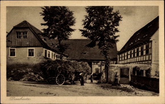 Ak Lommatzsch in Sachsen, Häuser mit Bäumen und einer Kutsche, ländliche Szene, foto