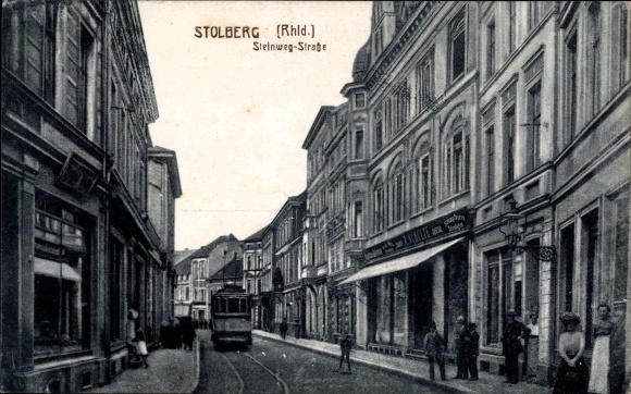 Postcard Stolberg im Rheinland, Steinweg Strasse, tram, shop A. Schulte