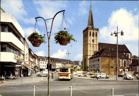 PC Viersen in North Rhine-Westphalia, Remigius Church, trees with flowers, blue sky, modern architecture...