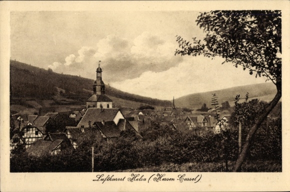 Postcard Helsa Hessen, partial view with church