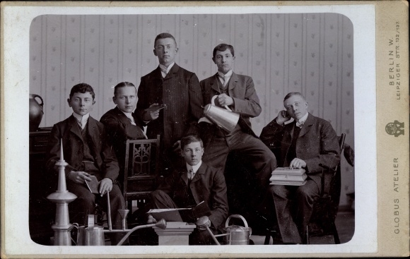 Cabinet photo of a group of young men working on sheet metal, Globus Atelier, Berlin