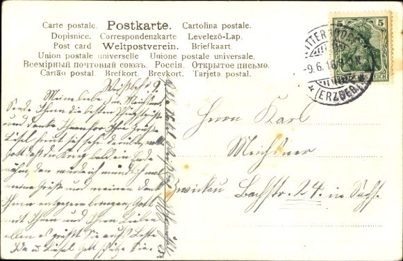 Postcard congratulations Pentecost, girl picking lilacs
