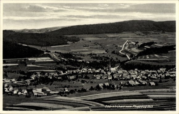 Postcard Oberkirchen Schmallenberg in Sauerland, aerial view of rural area, small houses, church