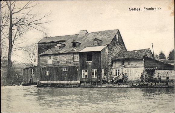 PC Selles sur Cher Loir et Cher, wooden house on the water, trees, lettering France