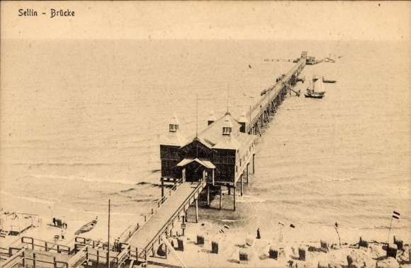 Ak Ostseebad Sellin op Rügen, Sellinbrug, pier, houten constructie, veel boten, Noordzee