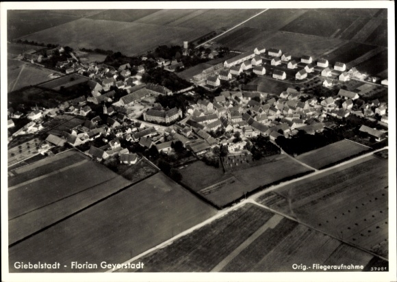 Postcard Giebelstadt in Lower Franconia, aerial photograph of residential buildings, fields, town structure