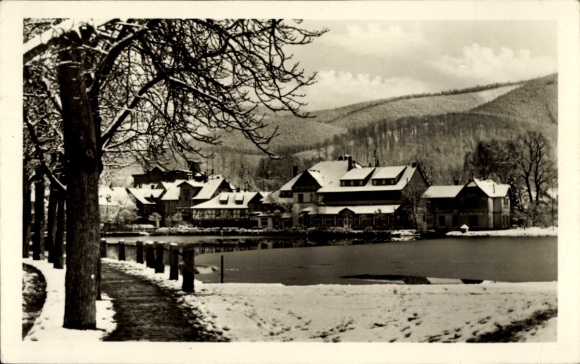 Postcard Isenburg im Sayntal Westerwald, snow-covered houses, winter landscape, lake, mountains