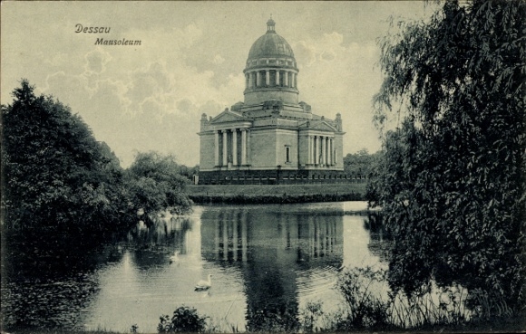 Postcard Dessau in Saxony-Anhalt, mausoleum, water view, cloud cover, plants in the foreground