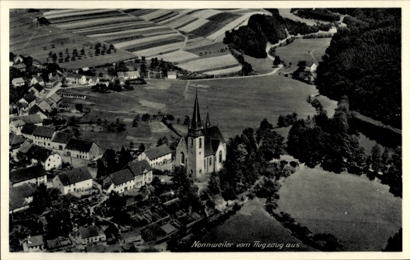 Ak Nonnweiler Saarland, luchtfoto, kerk, landschap, dorp, vliegtuig