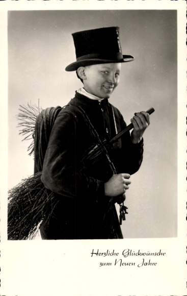 Happy New Year, boy as chimney sweep
