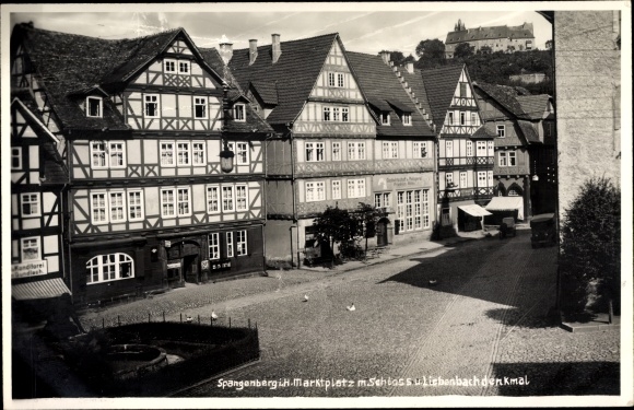 Postcard Spangenberg in Hesse, market place with castle, Liebenbach monument, half-timbered houses