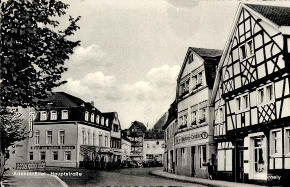 Postcard Adenau in the Eifel, main street, half-timbered houses, shops, busy street,