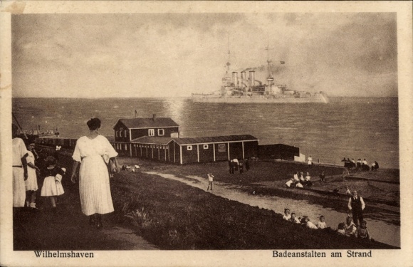 Postcard Wilhelmshaven on the North Sea, bathing establishments on the beach, warship