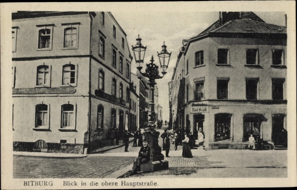 Ansichtkaart Bitburg Eifel Rijnland-Palts, uitzicht op de bovenste hoofdstraat, boekbinderij, eigenaar Karl Schilz