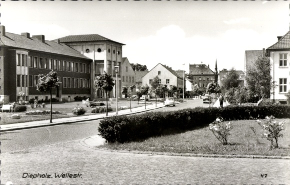 Ak Diepholz in Niedersachsen, Wellestraße, Stadtansicht, öffentliche Gebäude, Autos