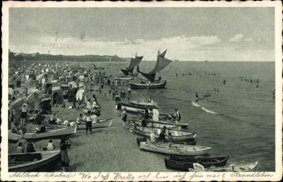 Postcard Ostseebad Ahlbeck on Usedom, beach with many people, boats on the shore, sailboats, beach chairs