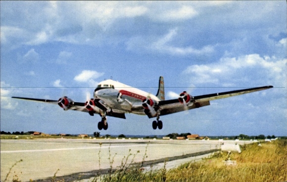 Postcard passenger aircraft Douglas DC 4, Cie Air Algérie, landing