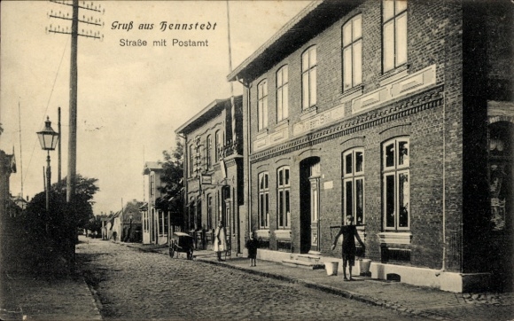 Ak Hennstedt in Dithmarschen, straat met postkantoor