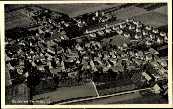 Postcard Würzburg am Main Lower Franconia, aerial view of Giebelstadt, many residential buildings, fields